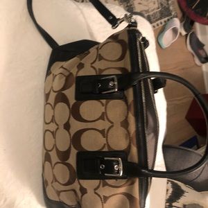 Coach shoulder bag. Classic brown printed with logo.